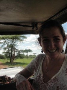 Liza with a giraffe, the pride of Tanzania, in the Serengeti National Park just 3 hours from where she lives