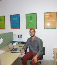 Jon at his desk at the Olam office.
