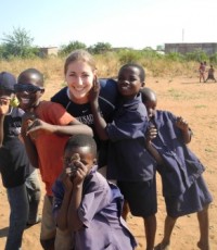 Sarah with some children at one of her P.E. classes.