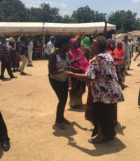 Faith dancing with a member of the Kibaha intergenerational project as part of an exercise break during the learning festival - March 2017