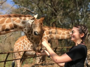 Liviya David feeding giraffes at the Giraffe Center in Nairobi.